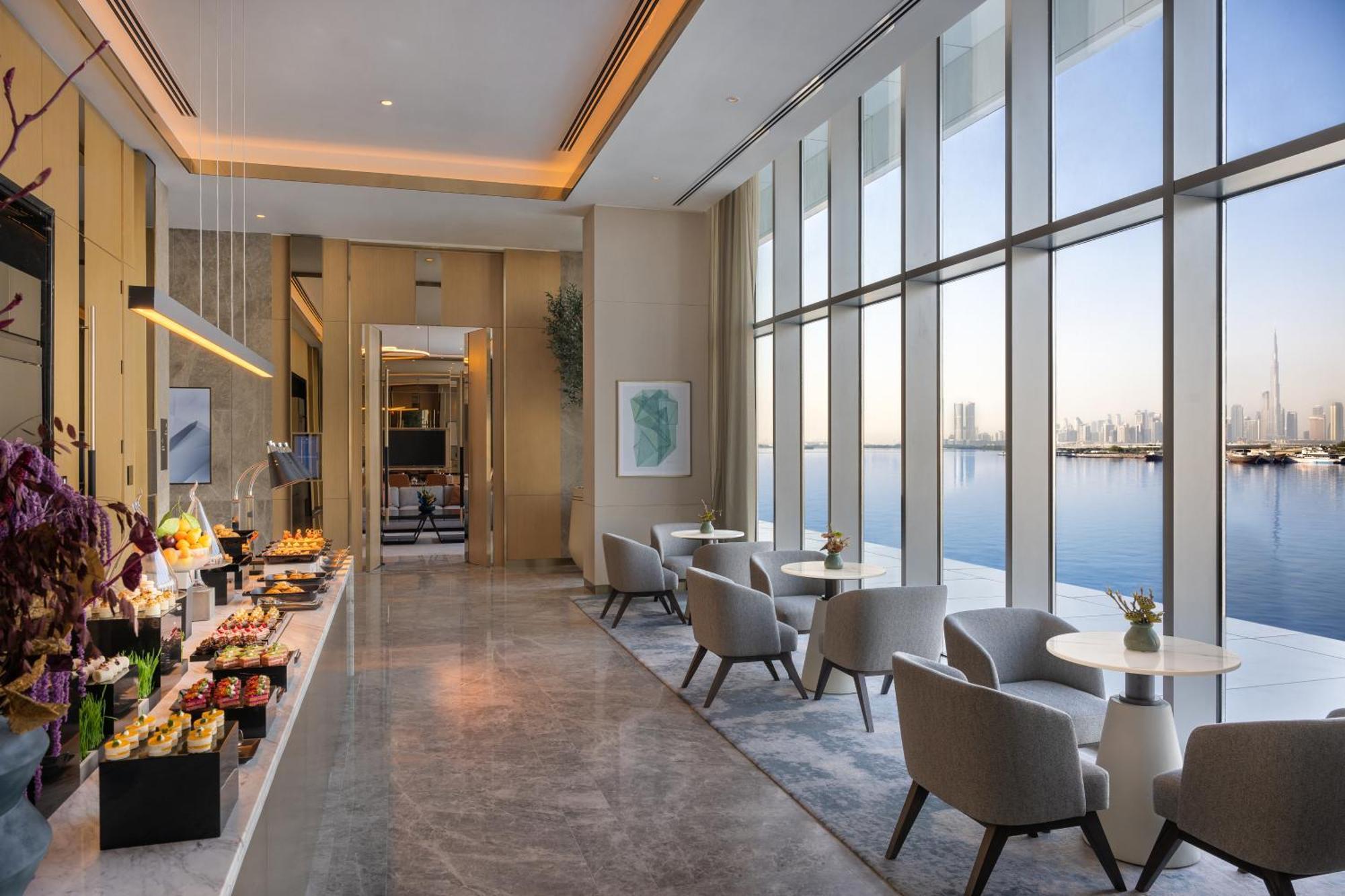Hotel Address Creek Harbour Dubái Exterior foto The lounge at the airport